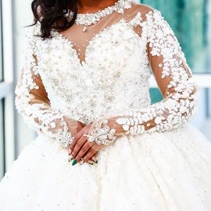 Ball gown wedding dress with heavy beading and crystal.